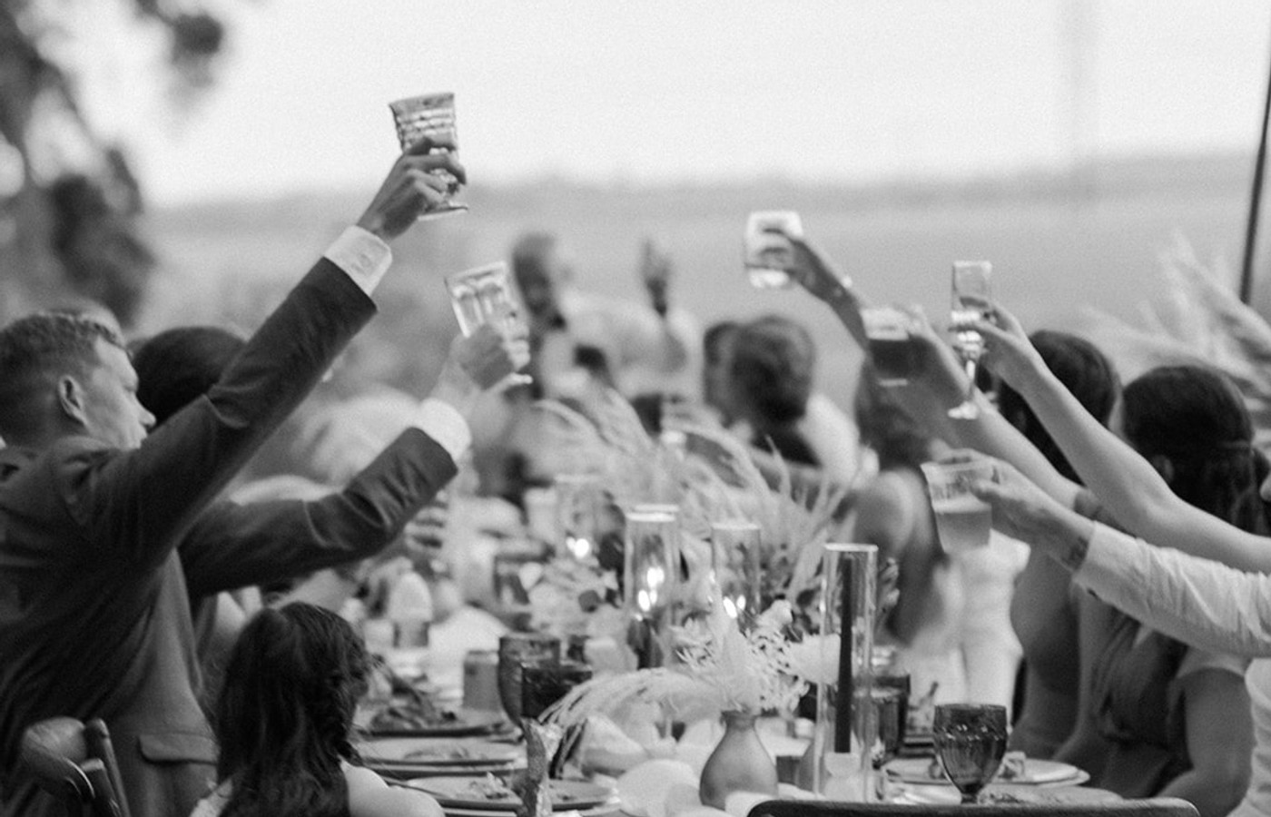 A champagne toast on the estate lawn
