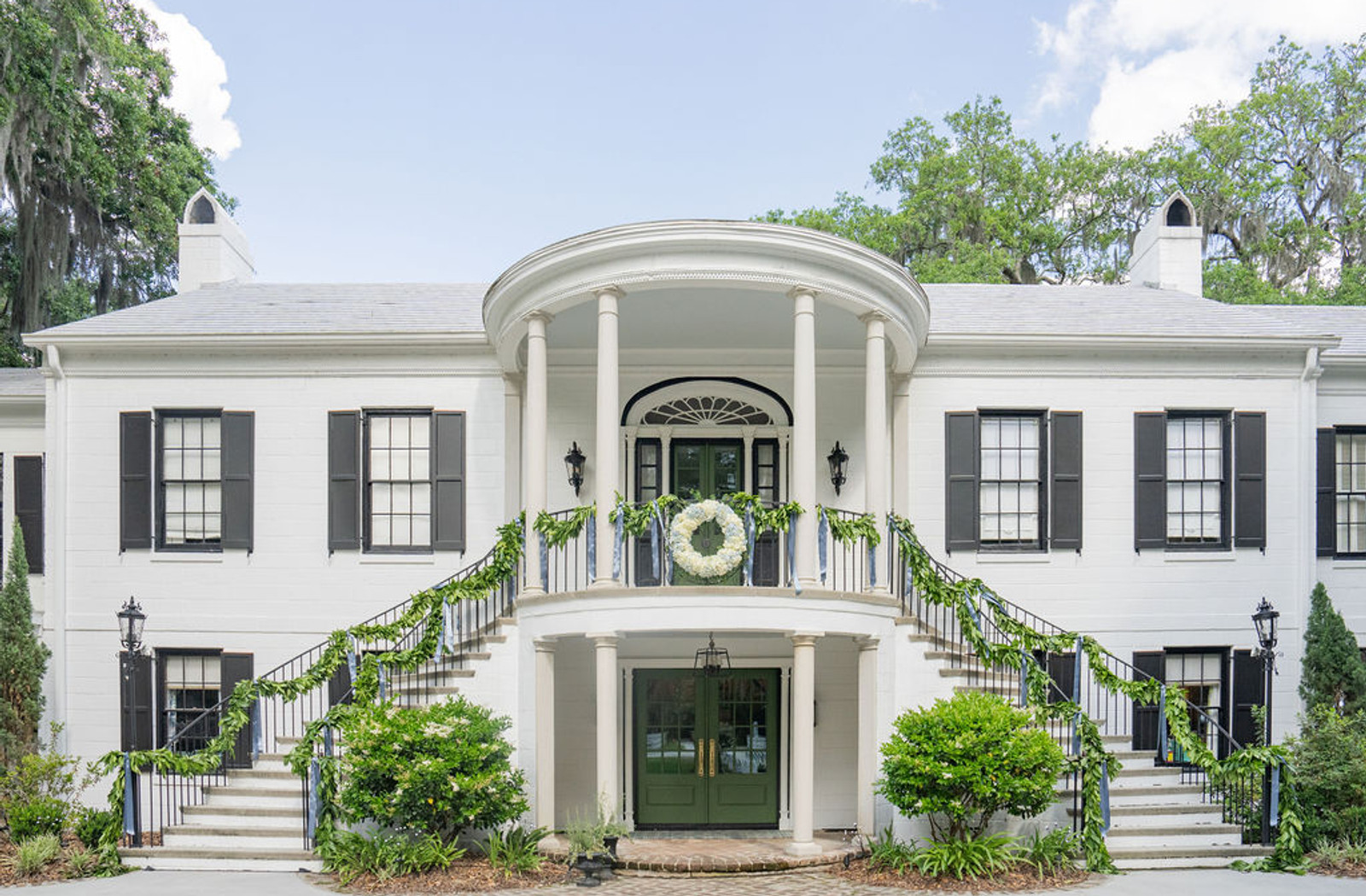 Live oaks and heirloom grounds surrounding the estate